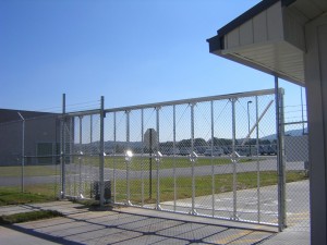 White Chain Link Fortress Heavy Duty Cantilever Slide Gate from TYMETAL Corp