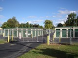 industrial chain link fence protecting a storage unit