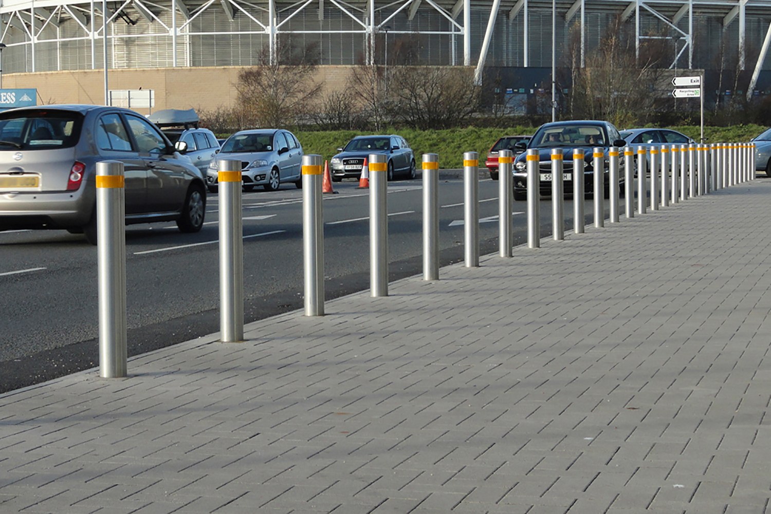 Carstopper 30 single shallow removable bollard installed on a sidewalk