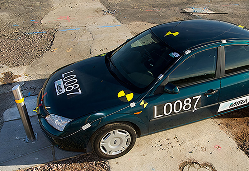 Carstopper 30 removable or fixed bollard in front of crash test car