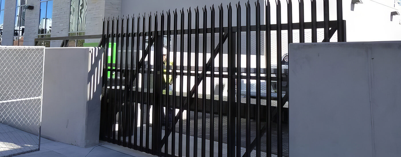 TCG-12 cantilever slide gate US DOS K12 in front of building