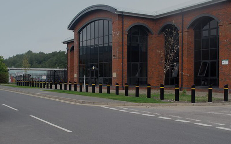 Truckstopper 3 fixed bollards in front of building