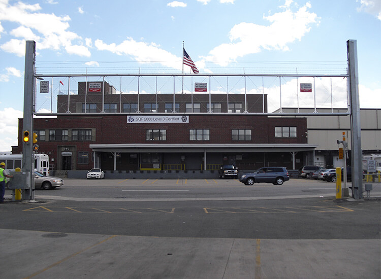 vertical lift gate in front of parking lot