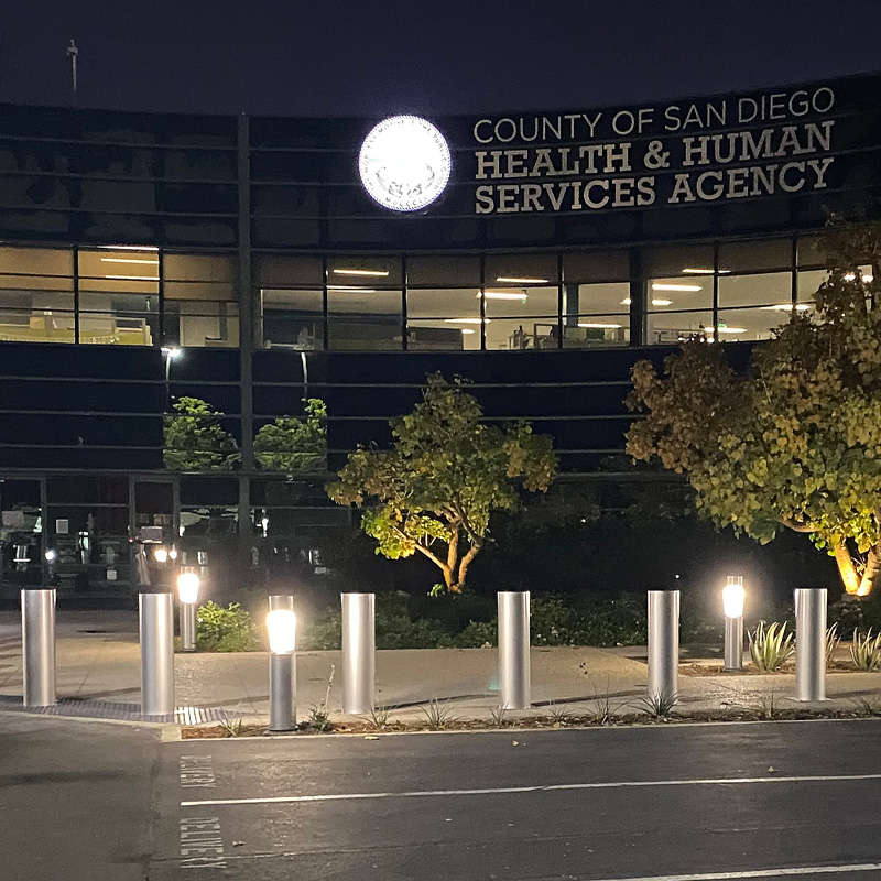 Crash bollards in parking lot at the County of San Diego Health & Human Services Agency