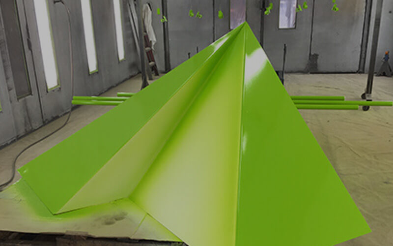 Piece of metal painted lime green