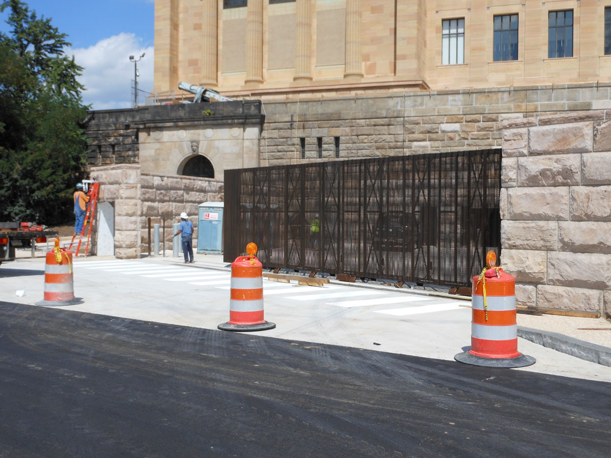Philadelphia Museum of Art gate with person standing in open gap