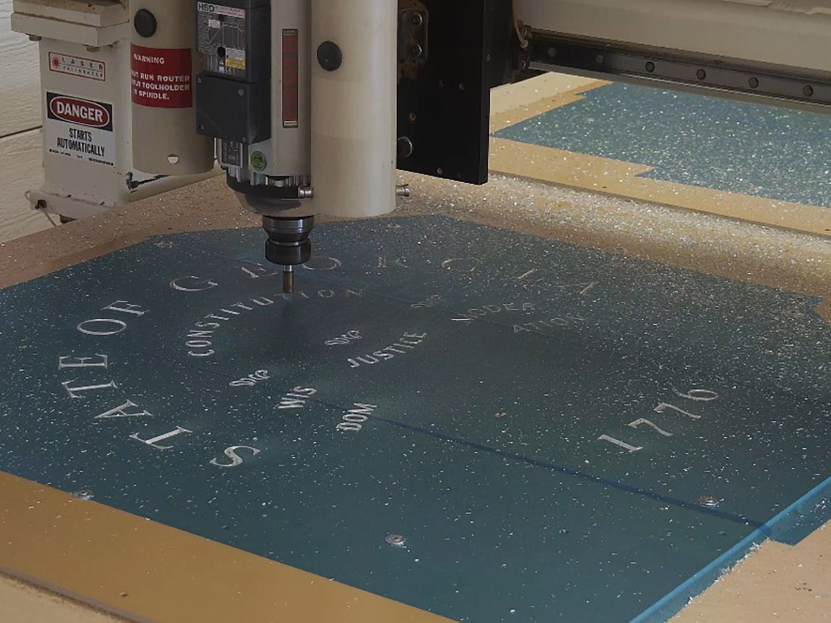 Georgia State Capitol gate seal emblem being machined
