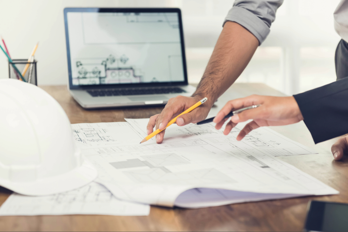 A team of executives discuss risk mitigation and commercial security measures