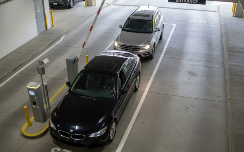 Two cars pull into a secure and private property, while the gate enforces anti-tailgating efforts.